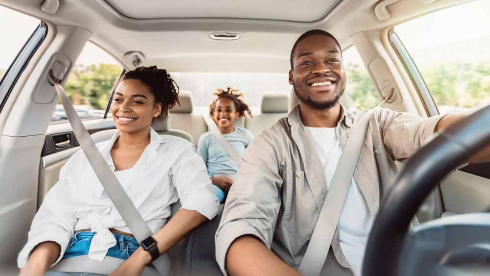 A family in the car driving from Nashville to Gatlinburg.